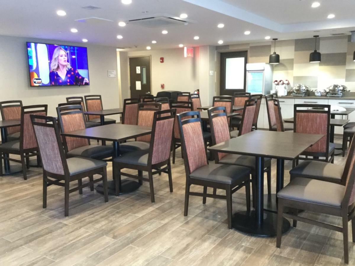 Отель Ramada By Wyndham Bronx Terminal Нью-Йорк Экстерьер фото